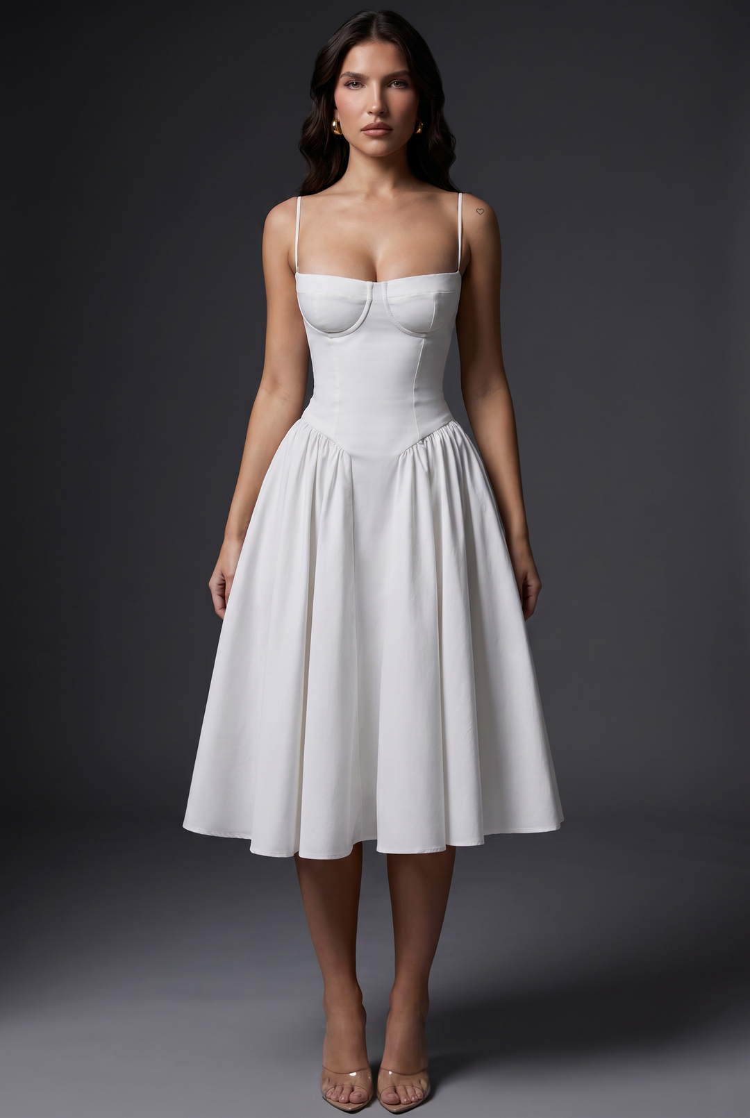 Woman in midi dress with structured bodice and flared skirt