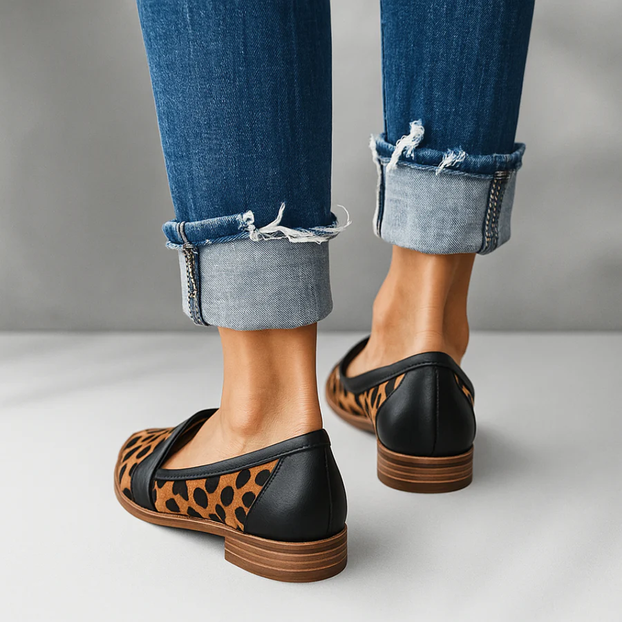Women's black pointed-toe orthopedic loafers with penny strap
