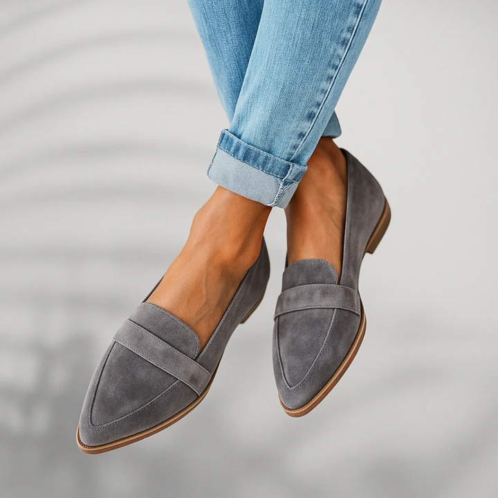 Women's black pointed-toe orthopedic loafers with penny strap