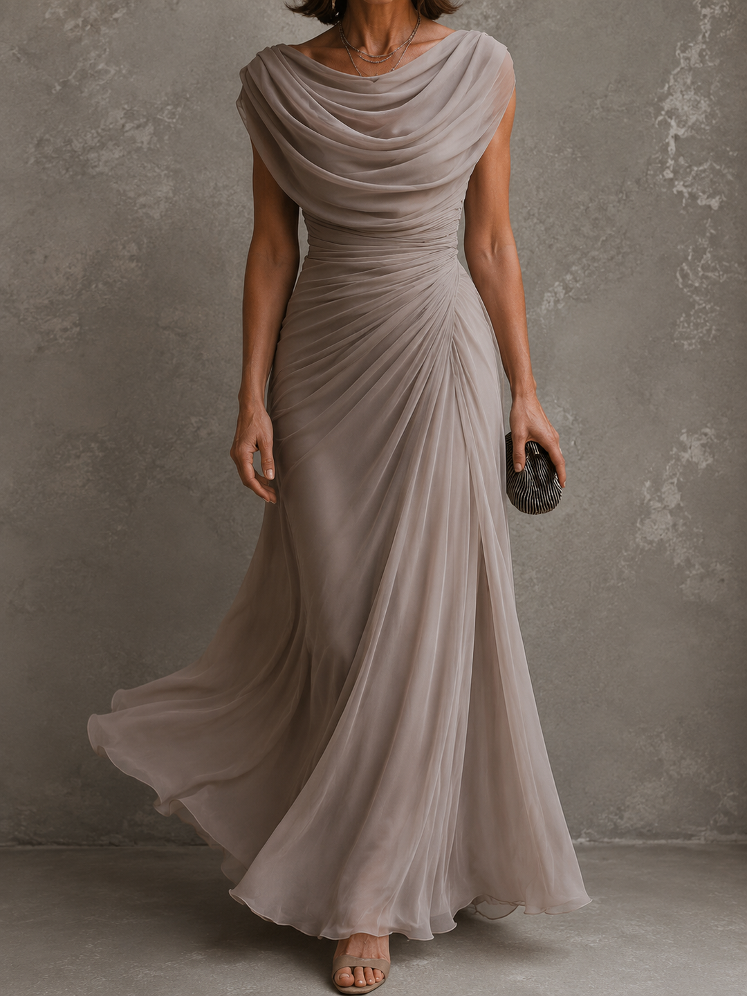 Woman wearing sleeveless draped maxi dress outdoors