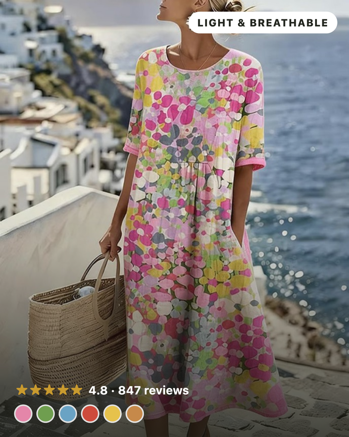 Woman wearing floral print midi dress with short sleeves