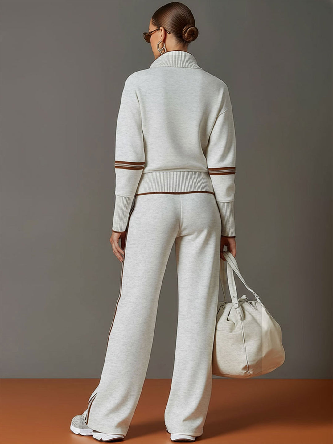 Woman wearing relaxed two piece wide leg set with blouse