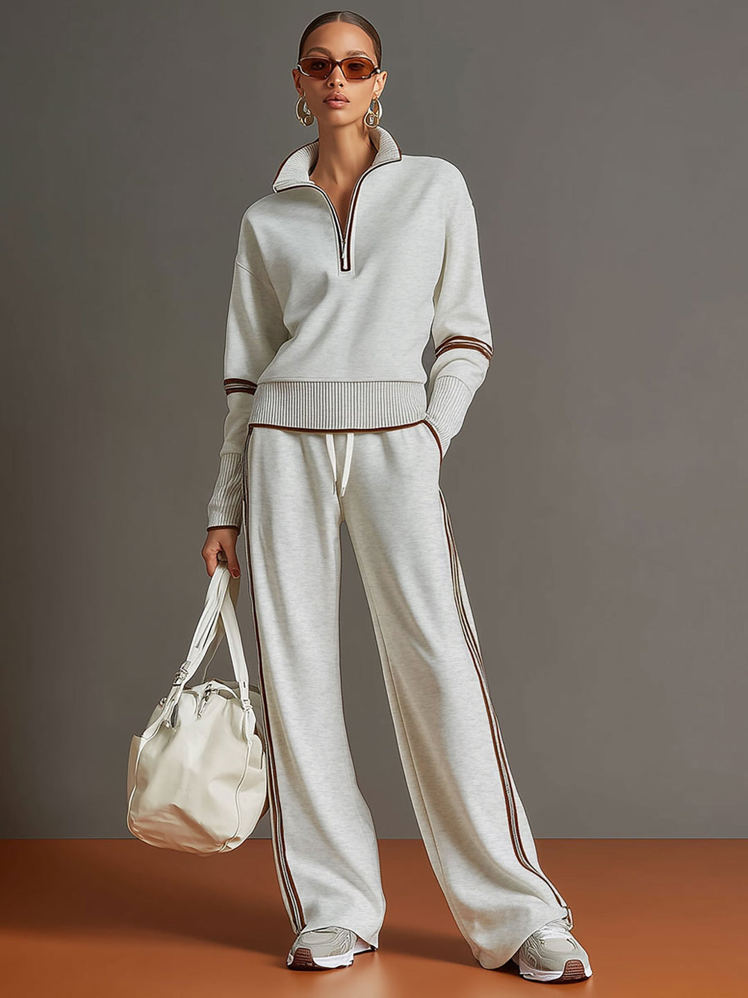 Woman wearing relaxed two piece wide leg set with blouse