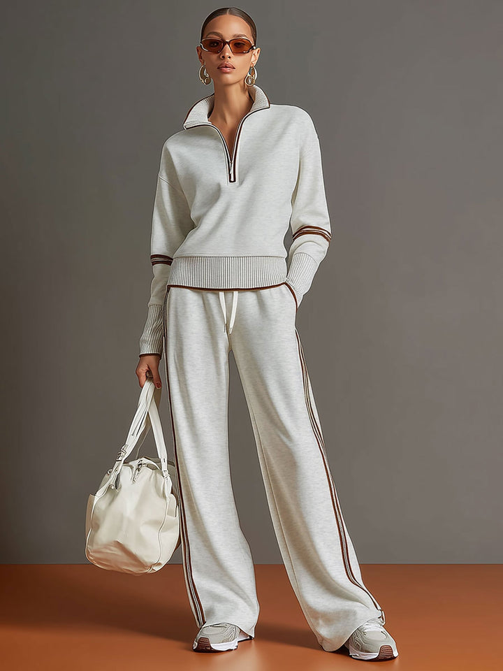 Woman wearing relaxed two piece wide leg set with blouse