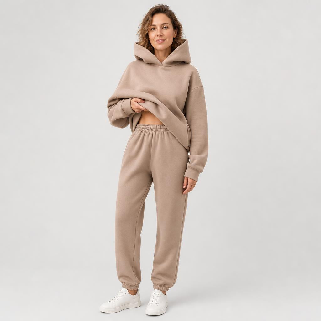 Woman wearing a hooded jogger set with elastic waist – khaki, worn by a model