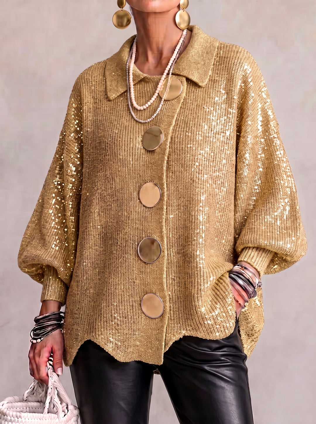 Woman wearing oversized cardigan with lantern sleeves