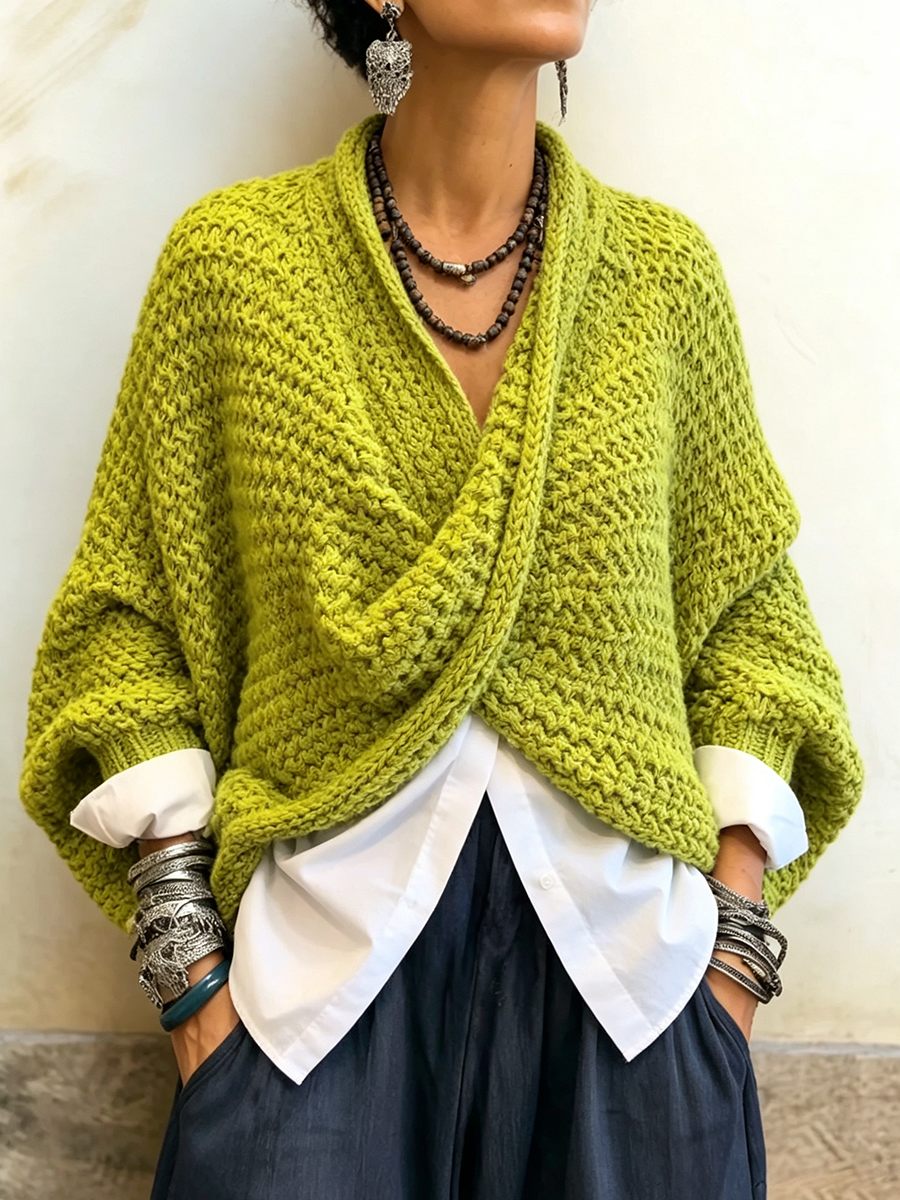 Woman wearing batwing crossover v-neck sweater in fall outfit