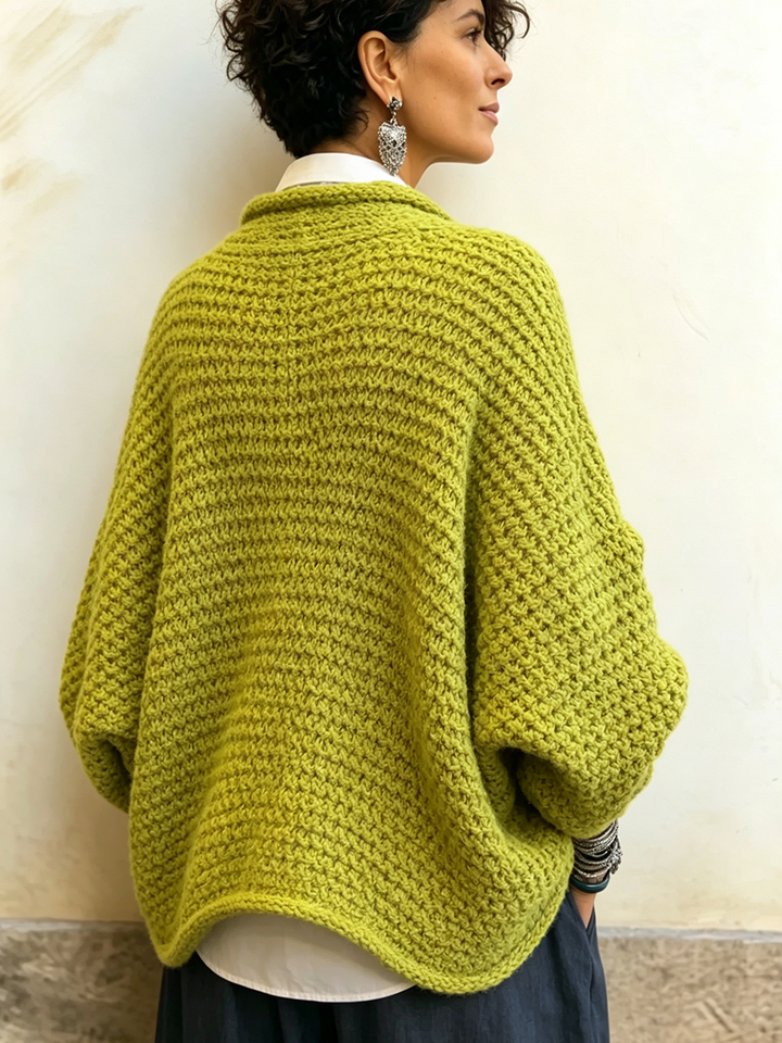 Woman wearing batwing crossover v-neck sweater in fall outfit