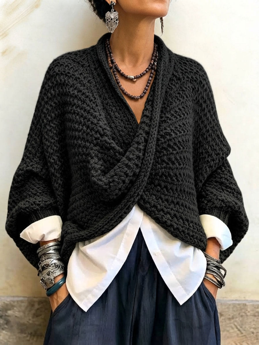 Woman wearing batwing crossover v-neck sweater in fall outfit