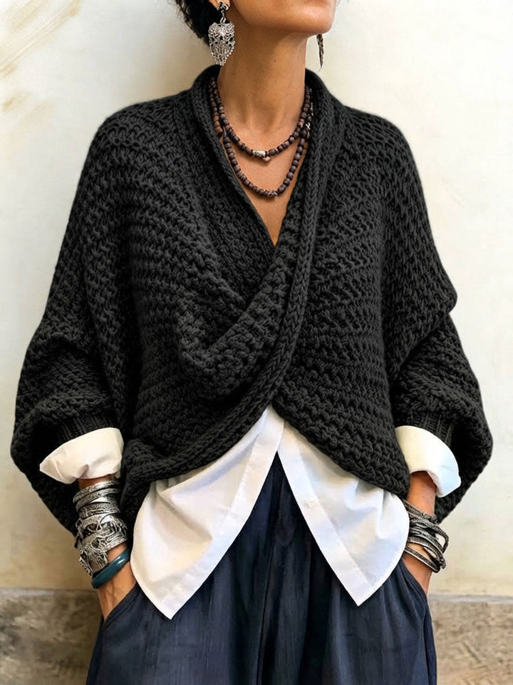Woman wearing batwing crossover v-neck sweater in fall outfit