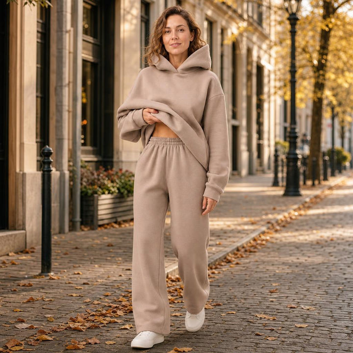 Woman wearing a hooded jogger set with elastic waist – lifestyle photo